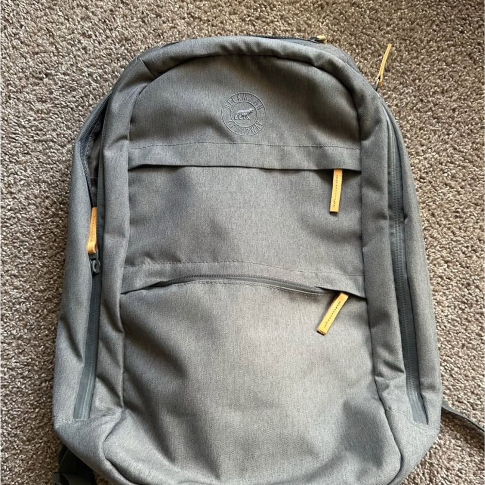 Classic Gray Backpack with Tan Details